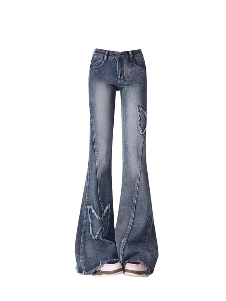 Vintage 90er Flared Jeans mit Low Waist & Rissen