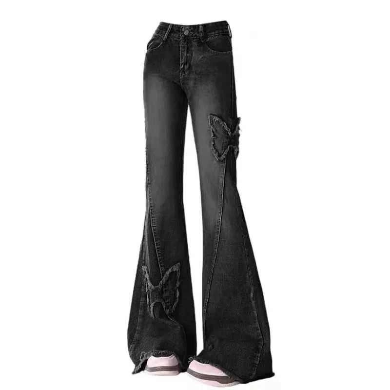 Vintage 90er Flared Jeans mit Low Waist & Rissen